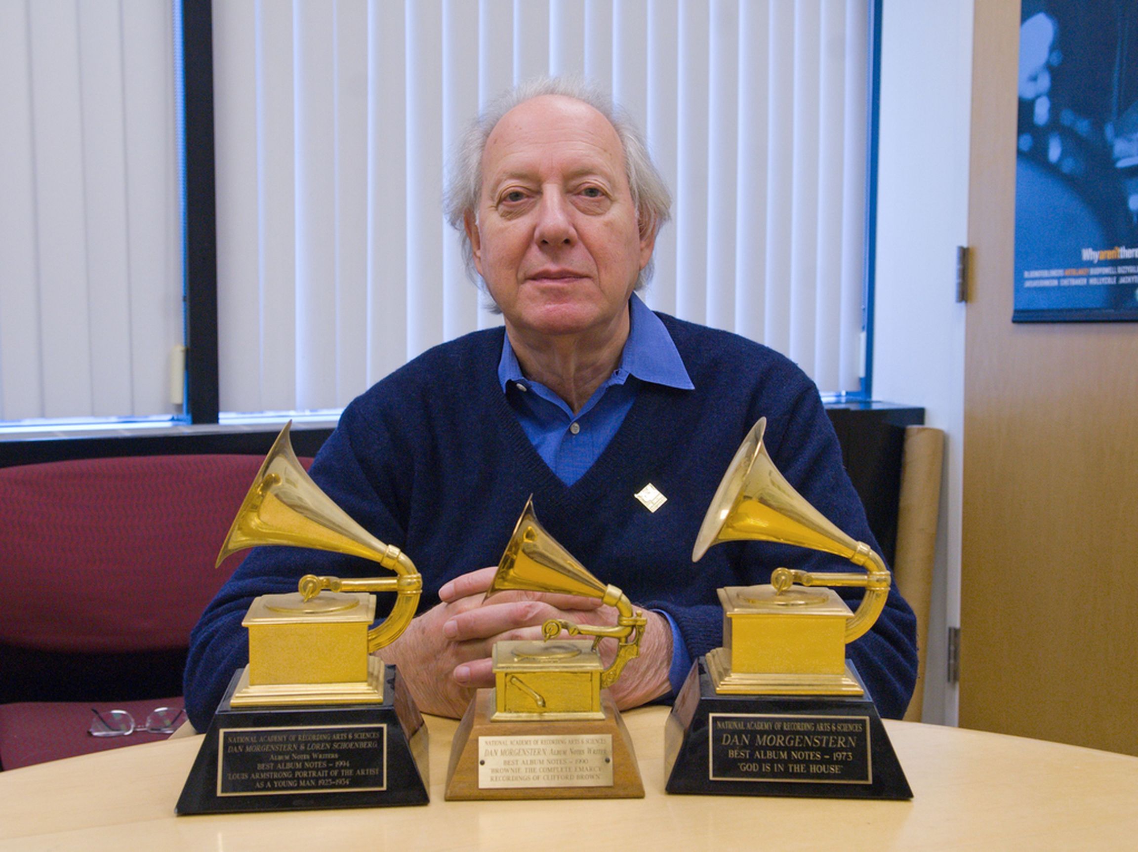 Dan Morgenstern with three Grammy Awards